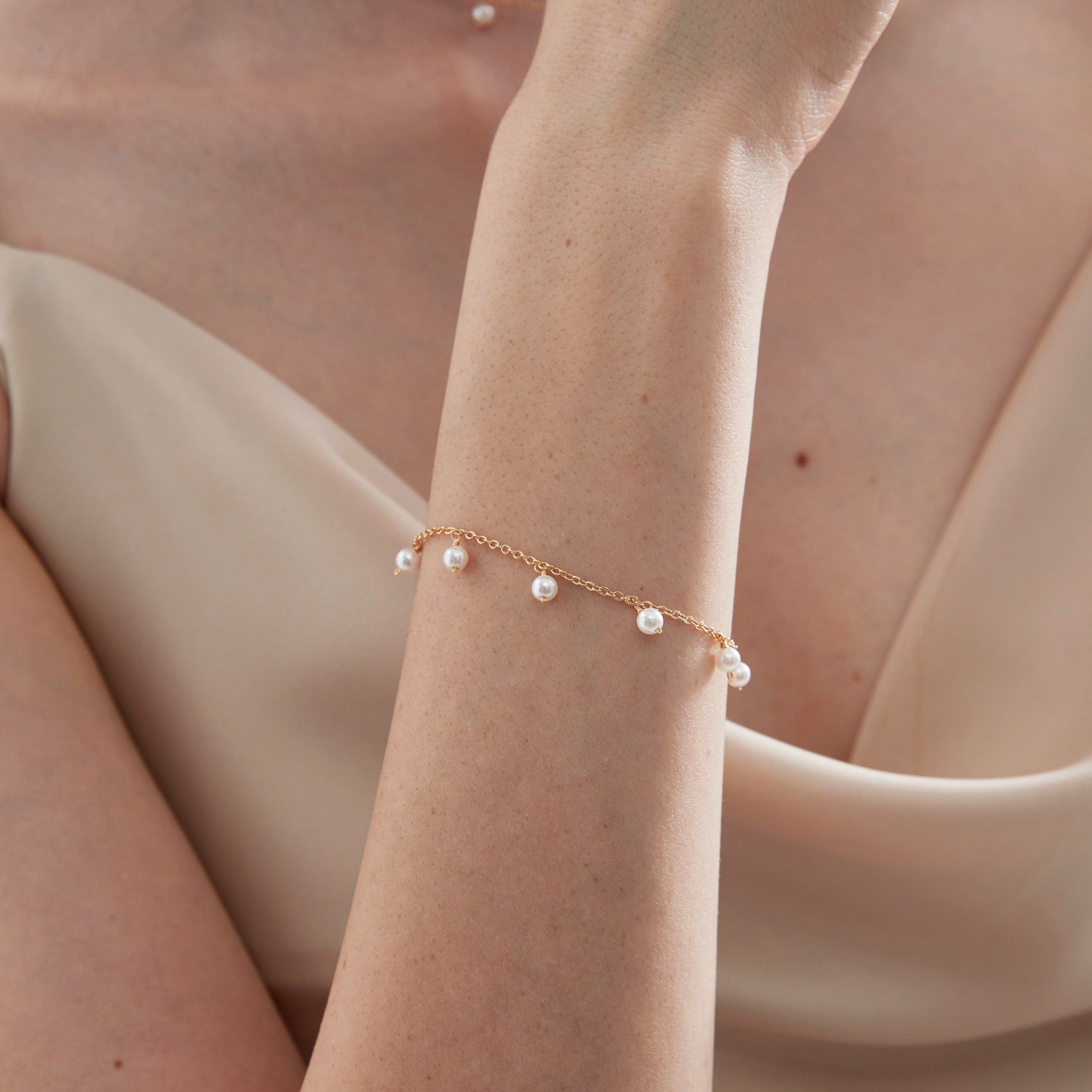 Beaded Pearl Minimalist Bracelet on hand