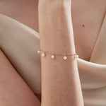 Beaded Pearl Minimalist Bracelet on hand