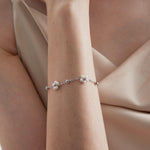 STMG Pearl Daisy Bracelet in silver on hand