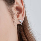 Flamingo Stud Earrings  on ear