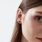 Blue Sandstone Stud Earrings on ear