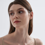 Geometric Chain Threader Earrings on ear