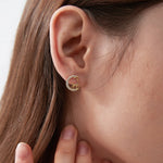 Crescent Moon Reindeer Stud Earrings on ear