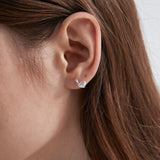 STMG Snail Stud Earrings on ear