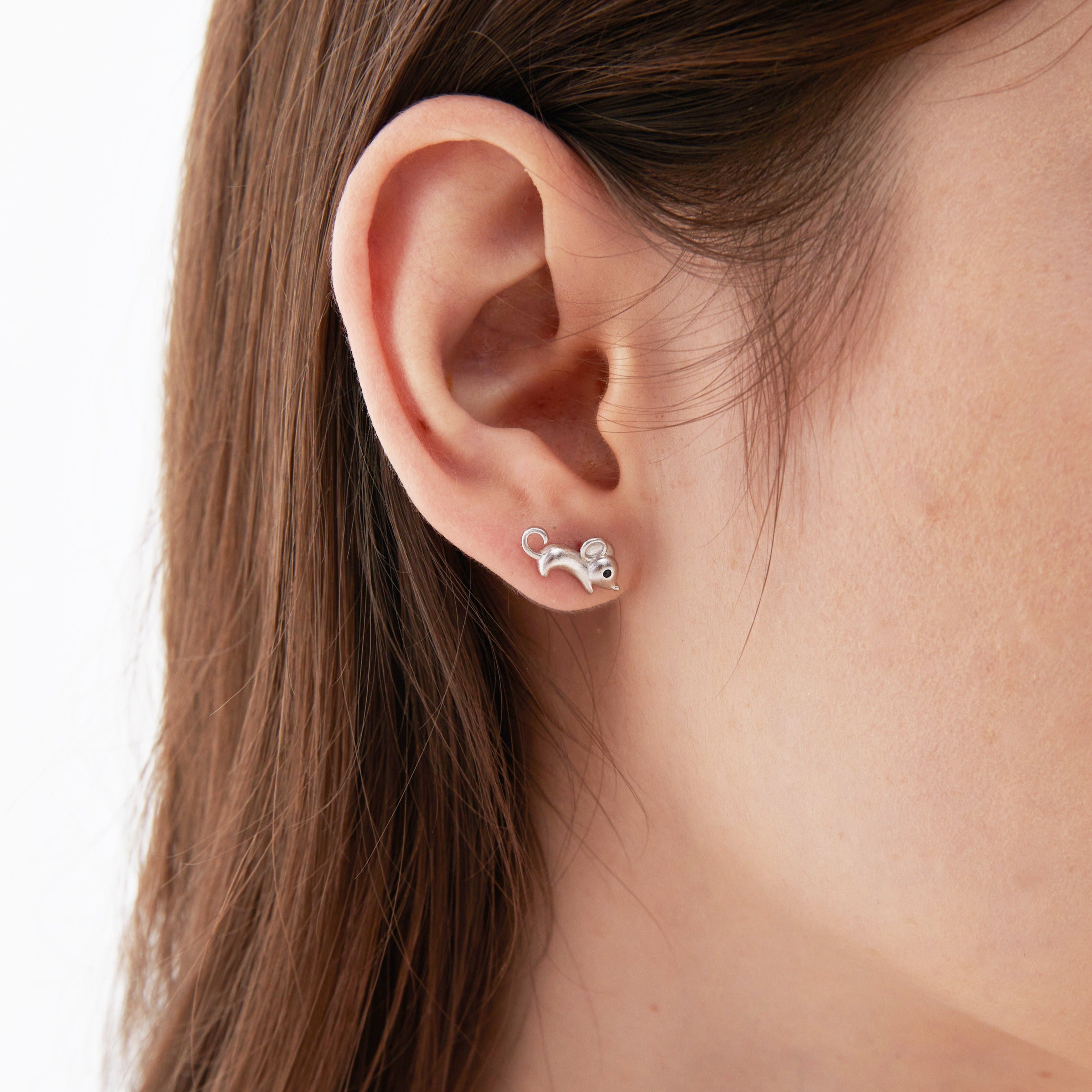 Mouse Stud Earrings on ear