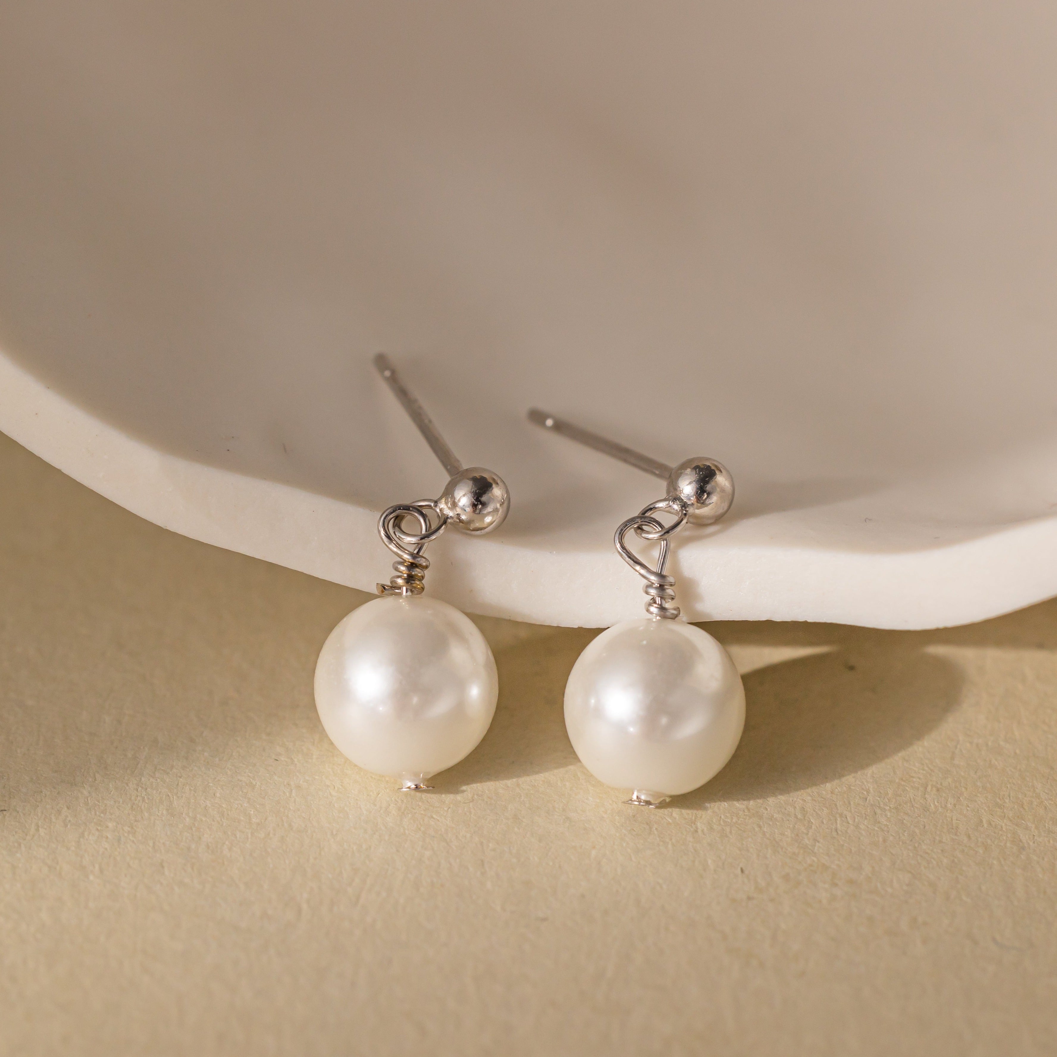 STMG Pearl Dangle Earrings in silver