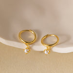 STMG Pearl Dangle Hoops in gold