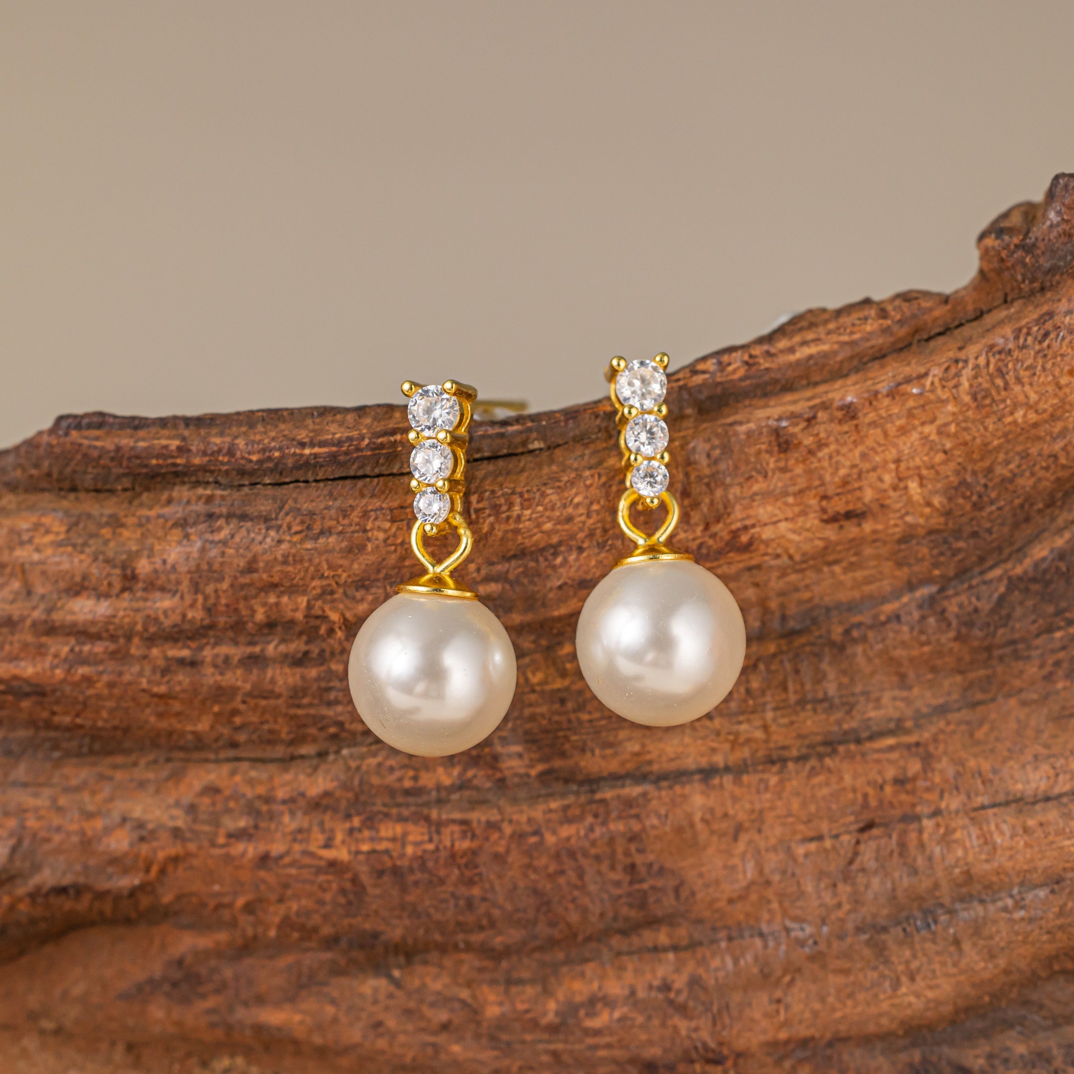 STMG Pearl Dangle Earrings in gold