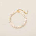 STMG Natural Pearl Adjustable Bracelet on hand