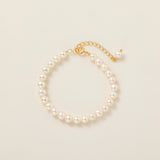 STMG Natural Pearl Adjustable Bracelet on hand