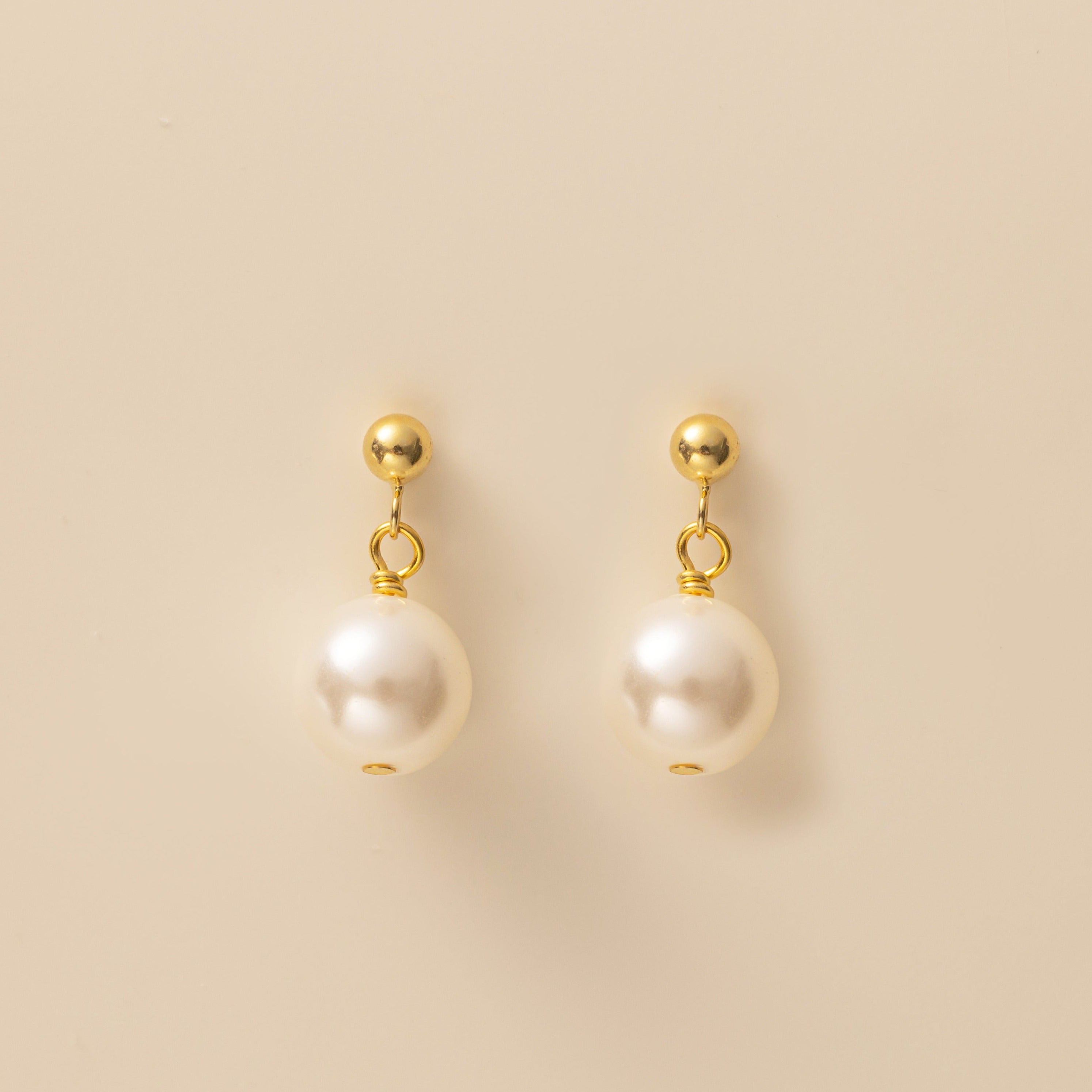 STMG Pearl Dangle Earrings in gold 