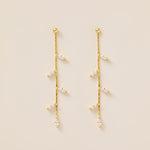 STMG Leaf Dangle Earrings in gold