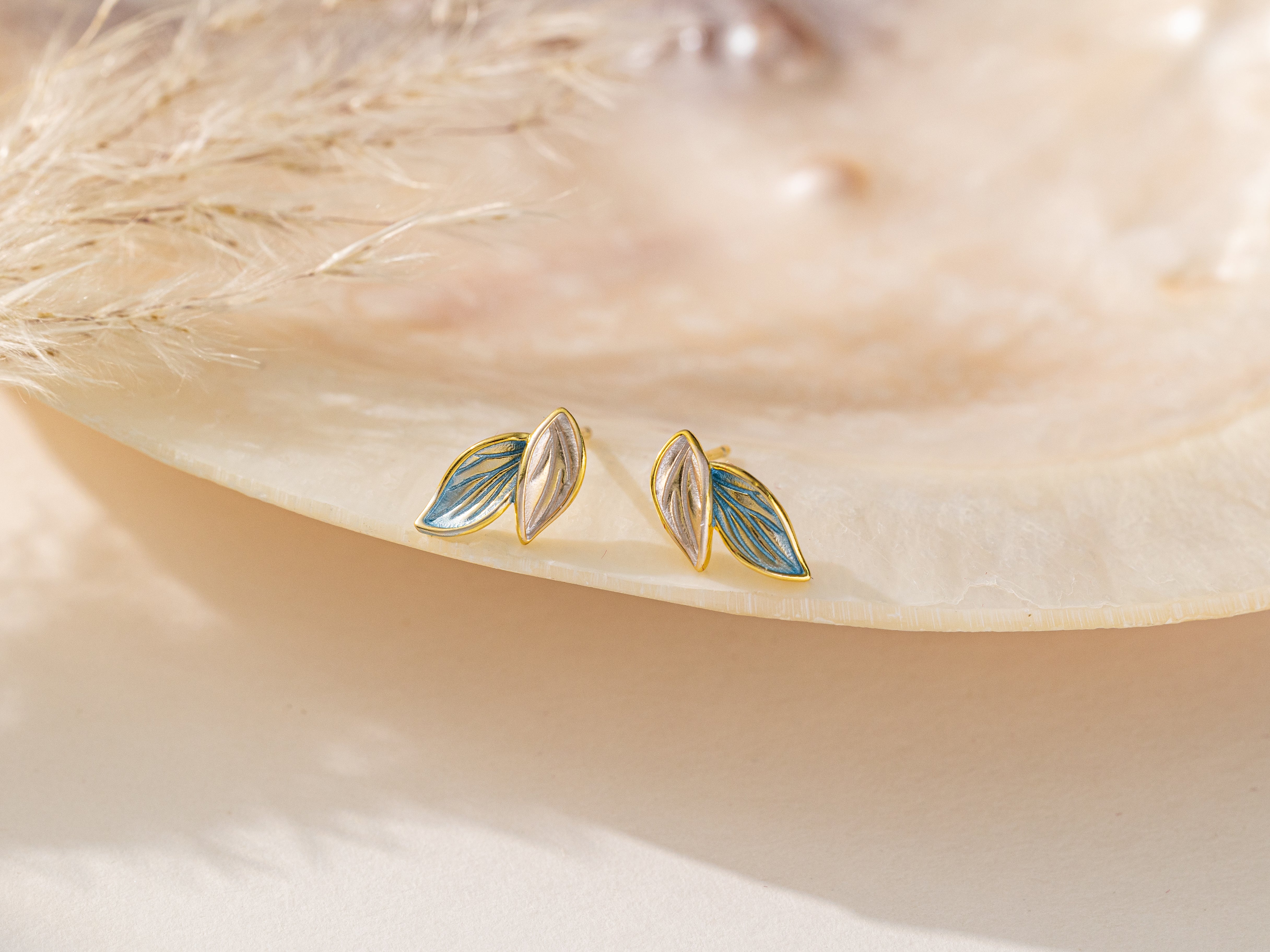 Blue Leaf Stud Earrings in gold