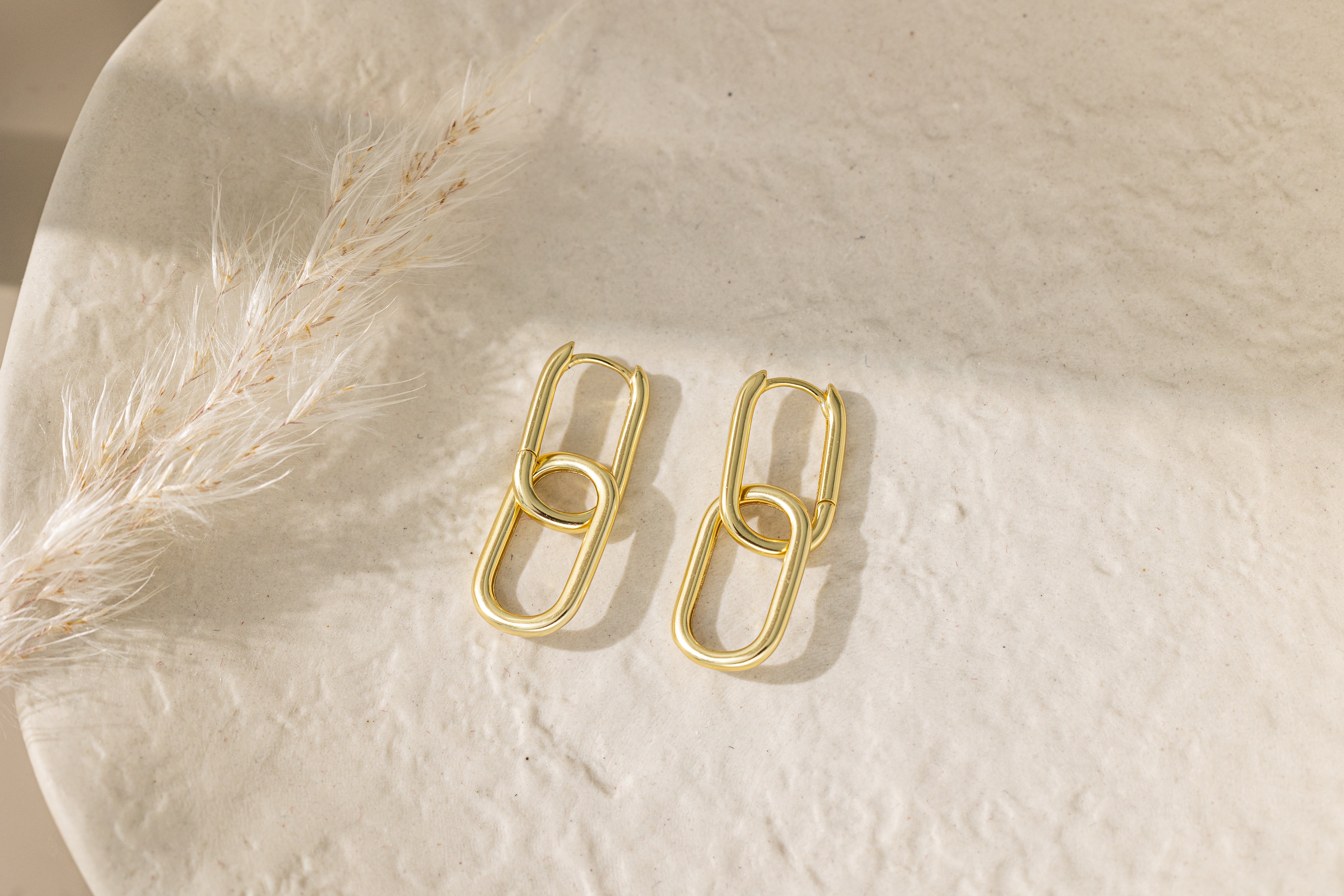 STMG Rectangular Dangle Hoops in gold