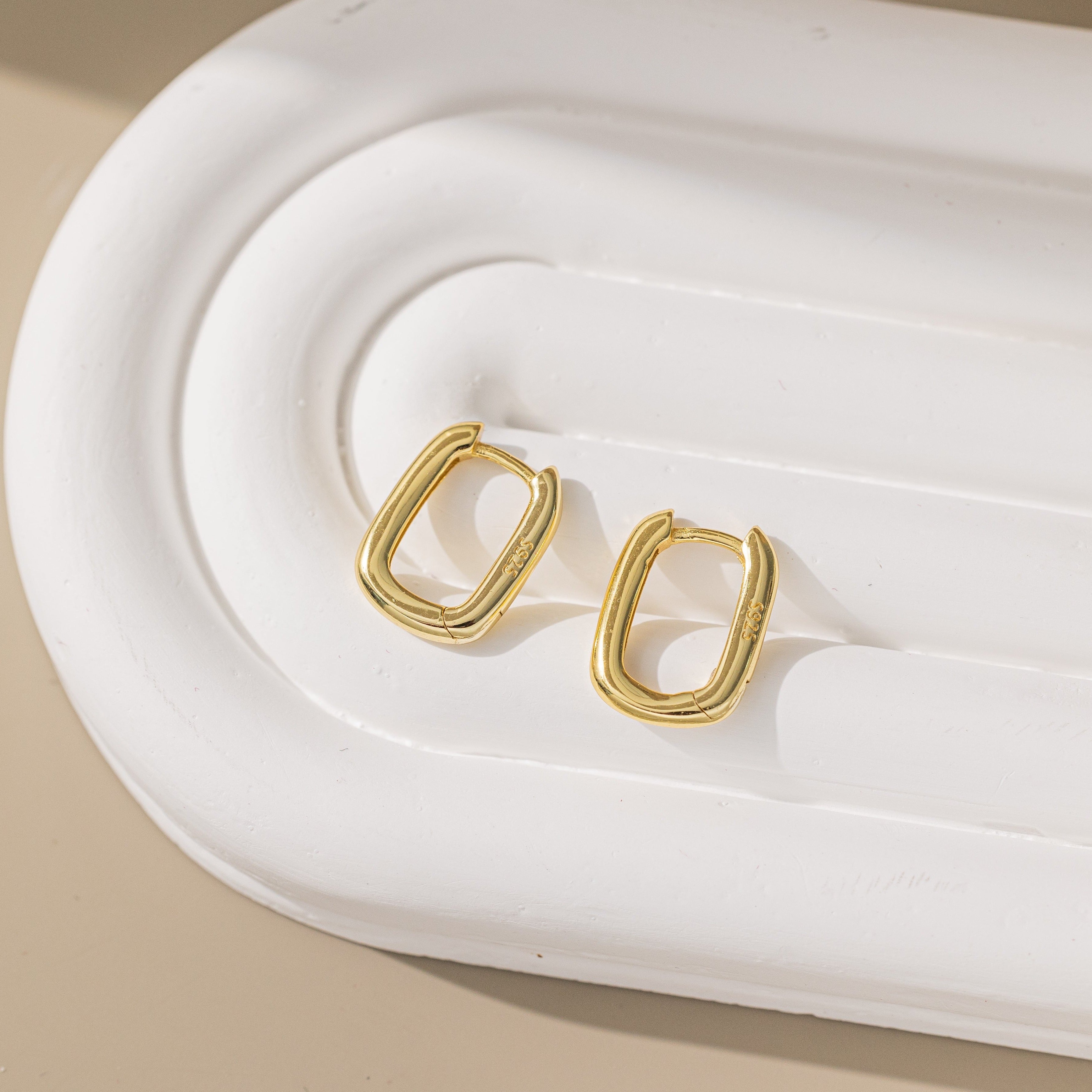 STMG Oval Rectangular Hoops in gold