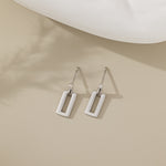 STMG Rectangle Dangle Earrings in silver