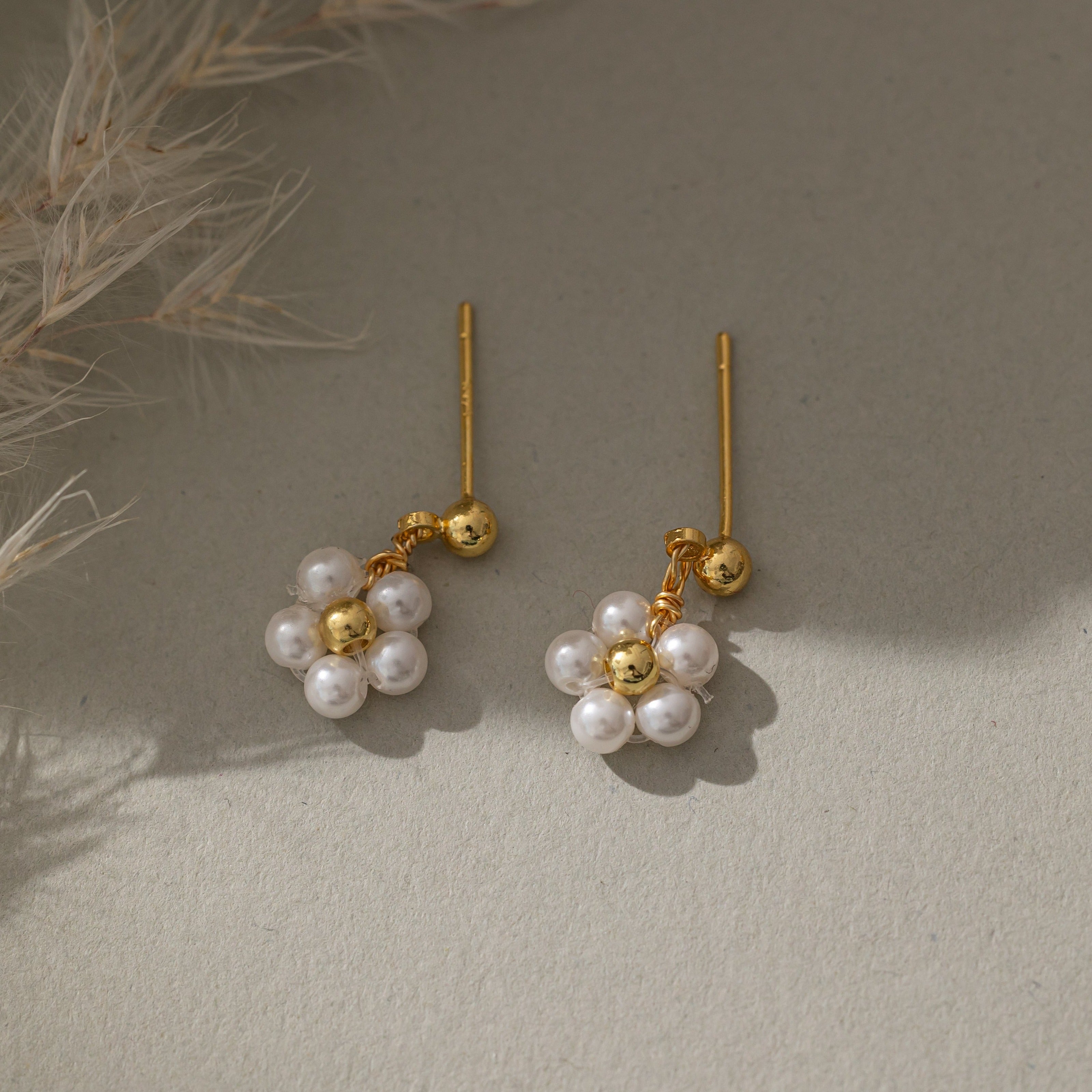 STMG Pearl Daisy Dangle Earrings in gold