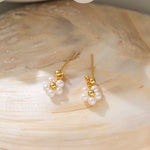 STMG Pearl Daisy Dangle Earrings in gold