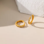 Diamond Twisted Circle Pave Hoops in gold