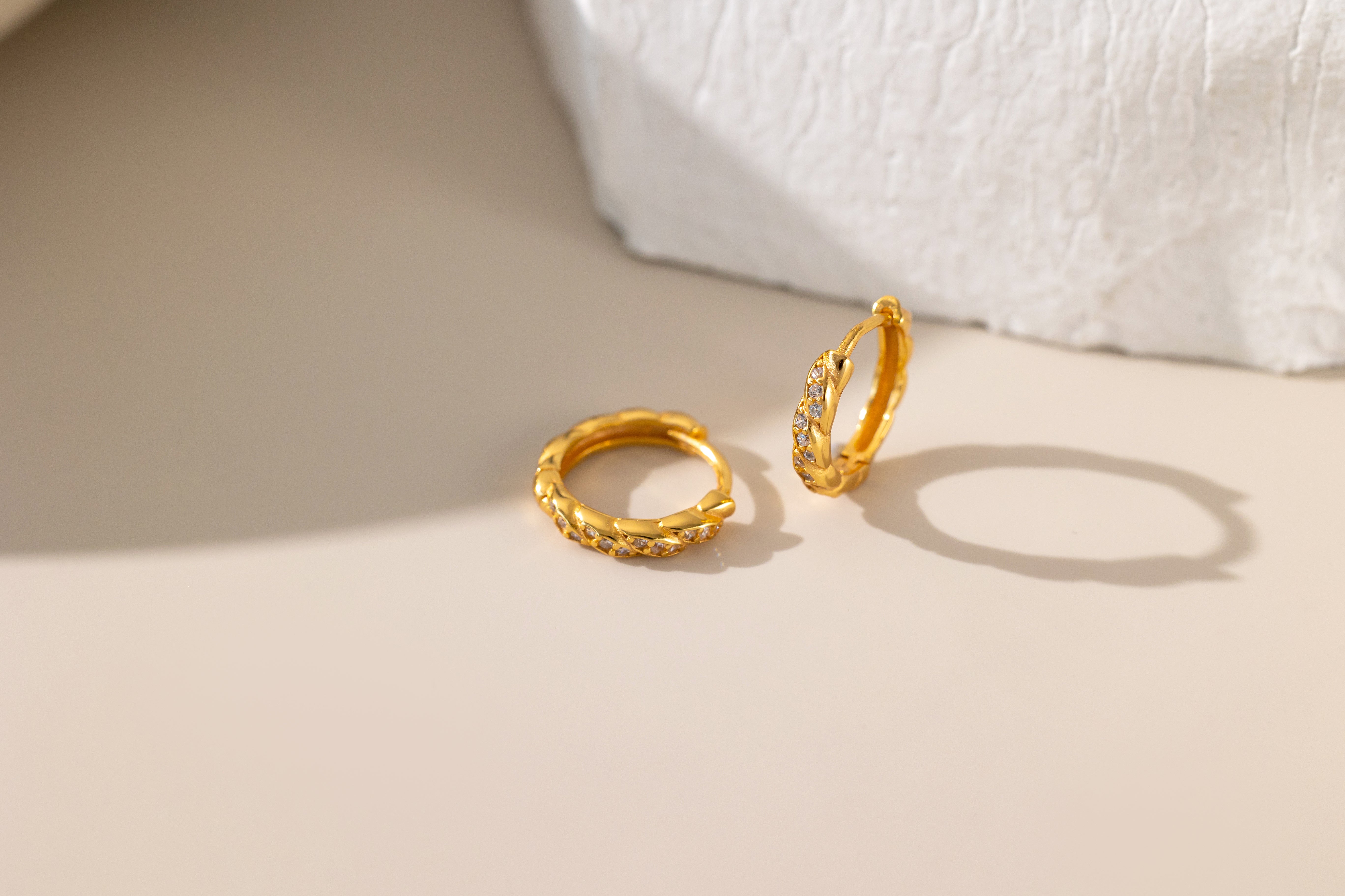 Diamond Twisted Circle Pave Hoops in gold