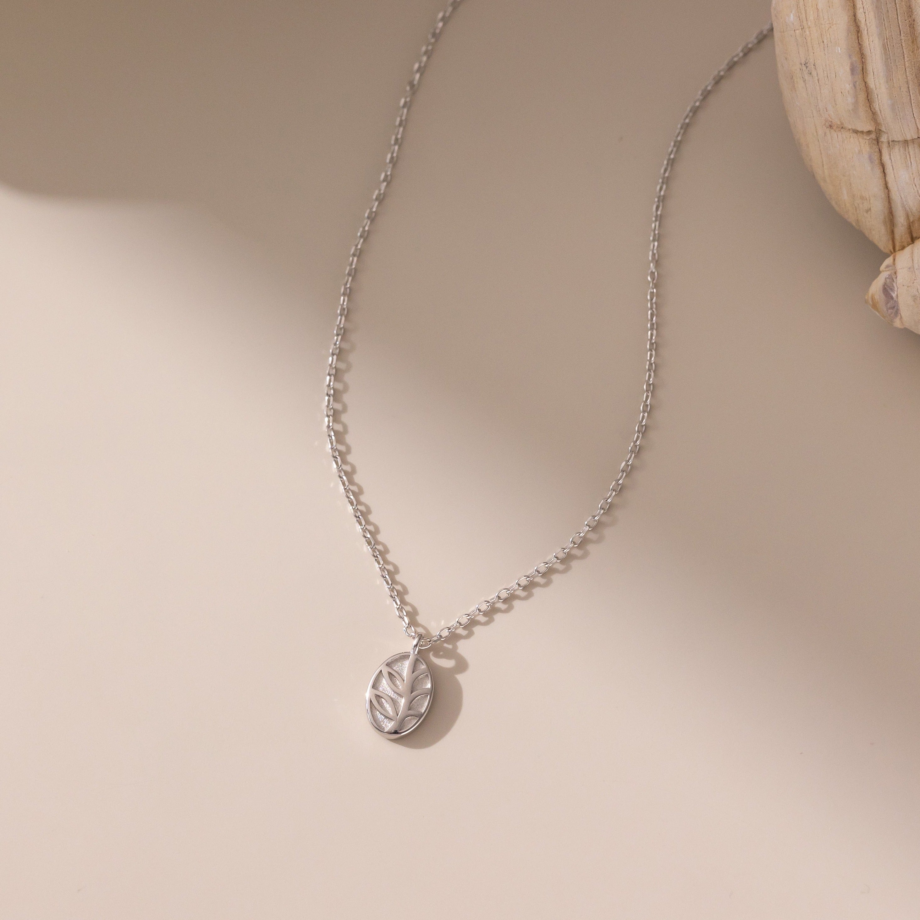 STMG Olive Leaf Oval Plate Necklace in silver