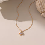 STMG Starburst Necklace in gold