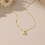 STMG Tiny Leaf Necklace in gold