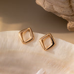 STMG Minimalist Rhombus Stud Earrings in champagne gold