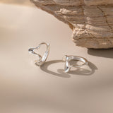 STMG Geometric Wave Hoops in silver