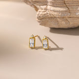 Emerald Cut Diamond Stud Earrings in gold