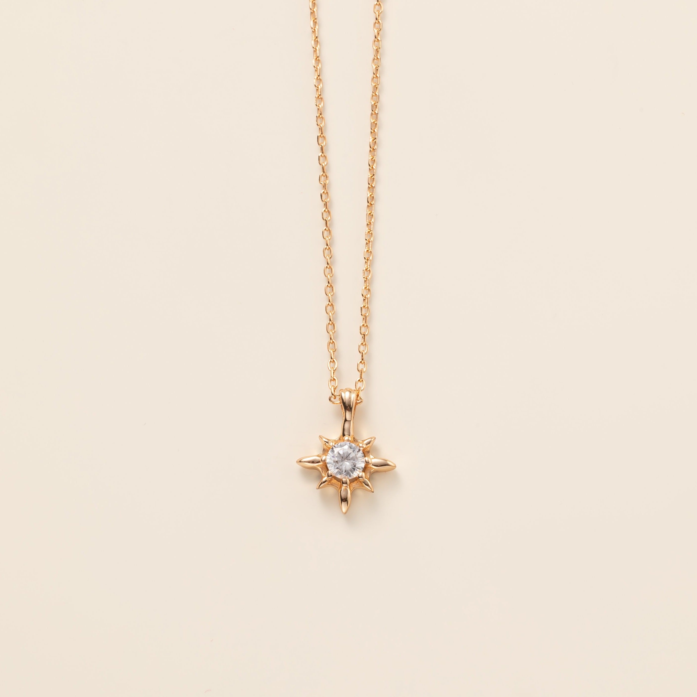 STMG Starburst Necklace in gold