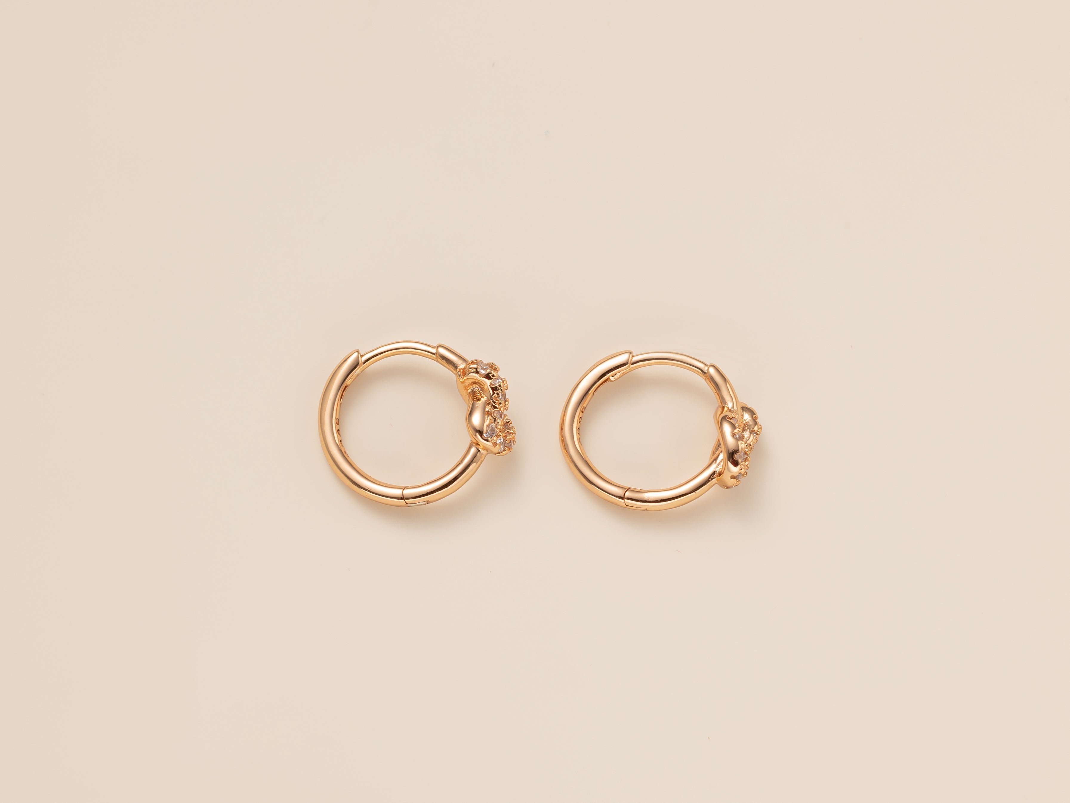 STMG Minimalist Knot Hoops in champagne gold