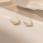 Curved Tiny Stud Earrings in gold