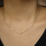 STMG Minimalist Diamond Necklace in gold on neck