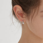 Diamond on Chain Hoops in silver on ear