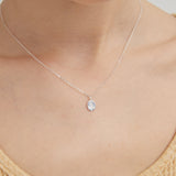 STMG Oval Plate Rose Necklace in silver on neck