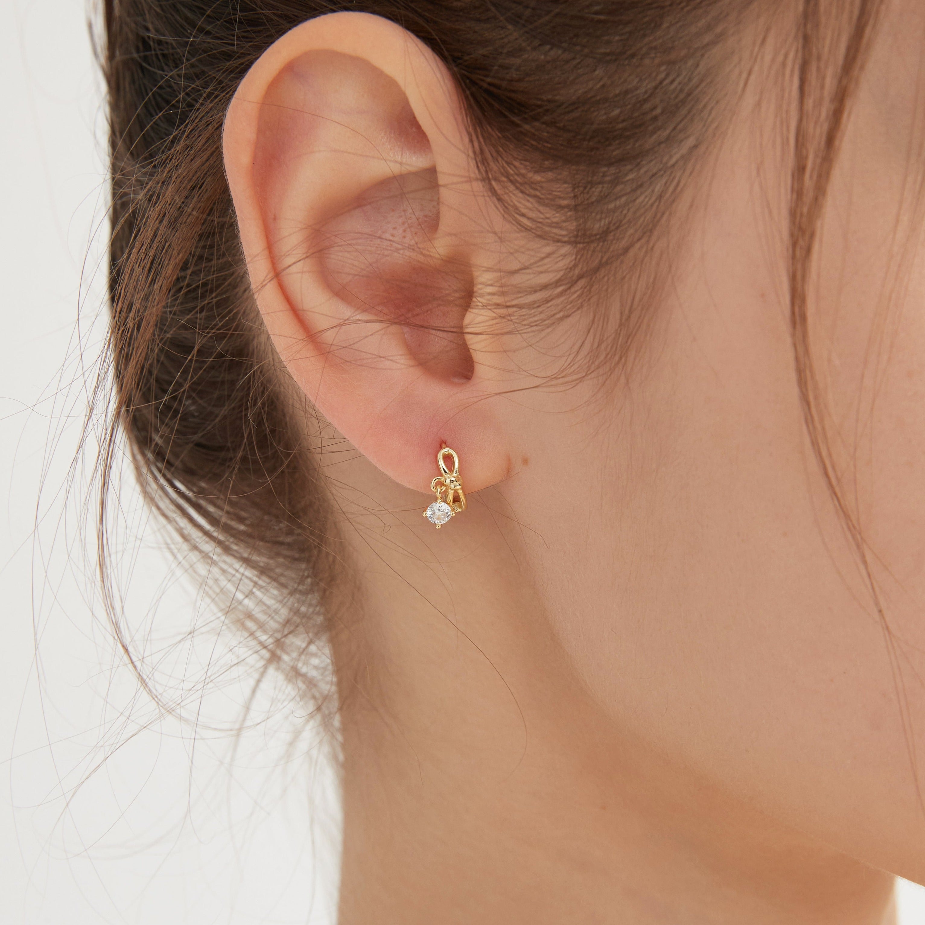 Bowknot Dangle Star Hoops on ear