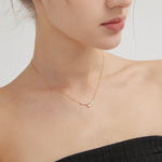 STMG Meteor Star Necklace on neck