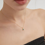 STMG Green Emerald Necklace on neck