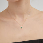 STMG Green Emerald Necklace on neck