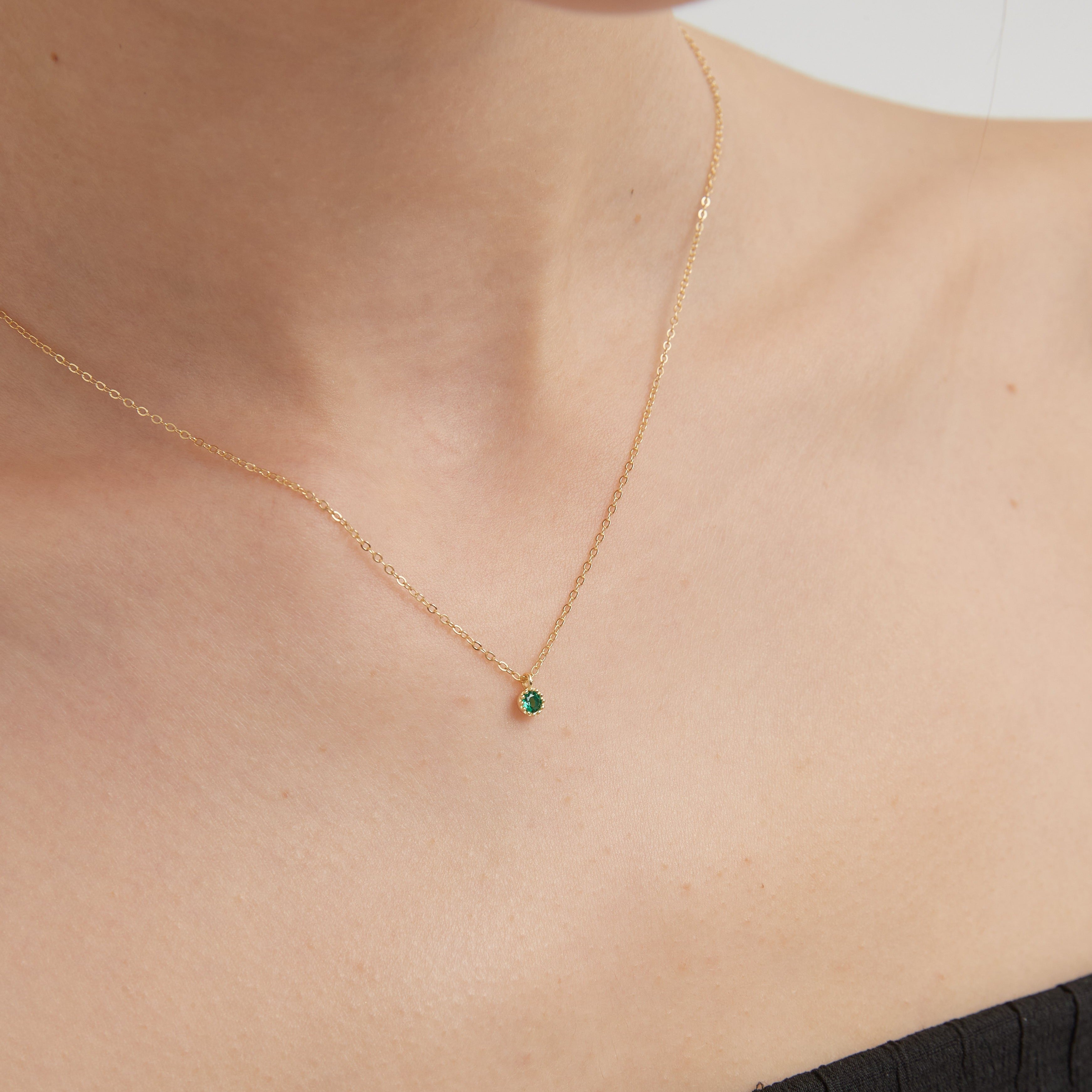 STMG Green Emerald Necklace on neck