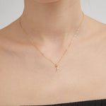 STMG Tiny Rose Necklace on neck