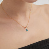 Blue Fire Opal Droplet Necklace on neck