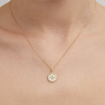 STMG Moonstone Snowflake Necklace on neck