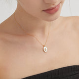 STMG Mother of Pearl with Tulip Necklace on neck