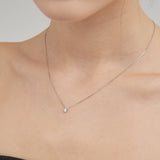 STMG Minimalist Star Necklace on neck