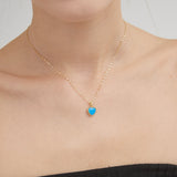 Blue Fire Opal Sweet Heart Necklace on neck