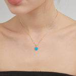 Blue Fire Opal Sweet Heart Necklace on neck