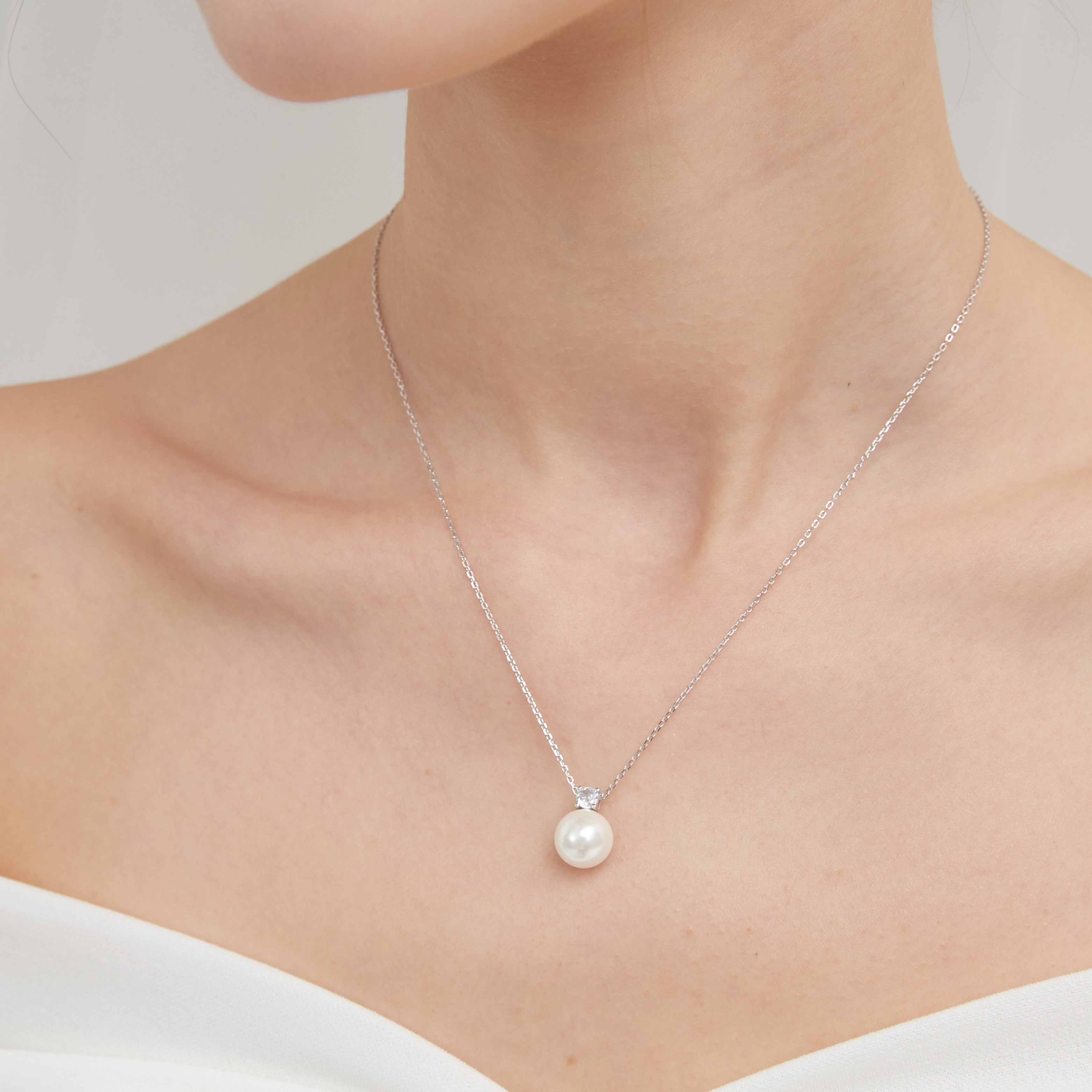 STMG Pearl Adjustable Necklace in silver on neck