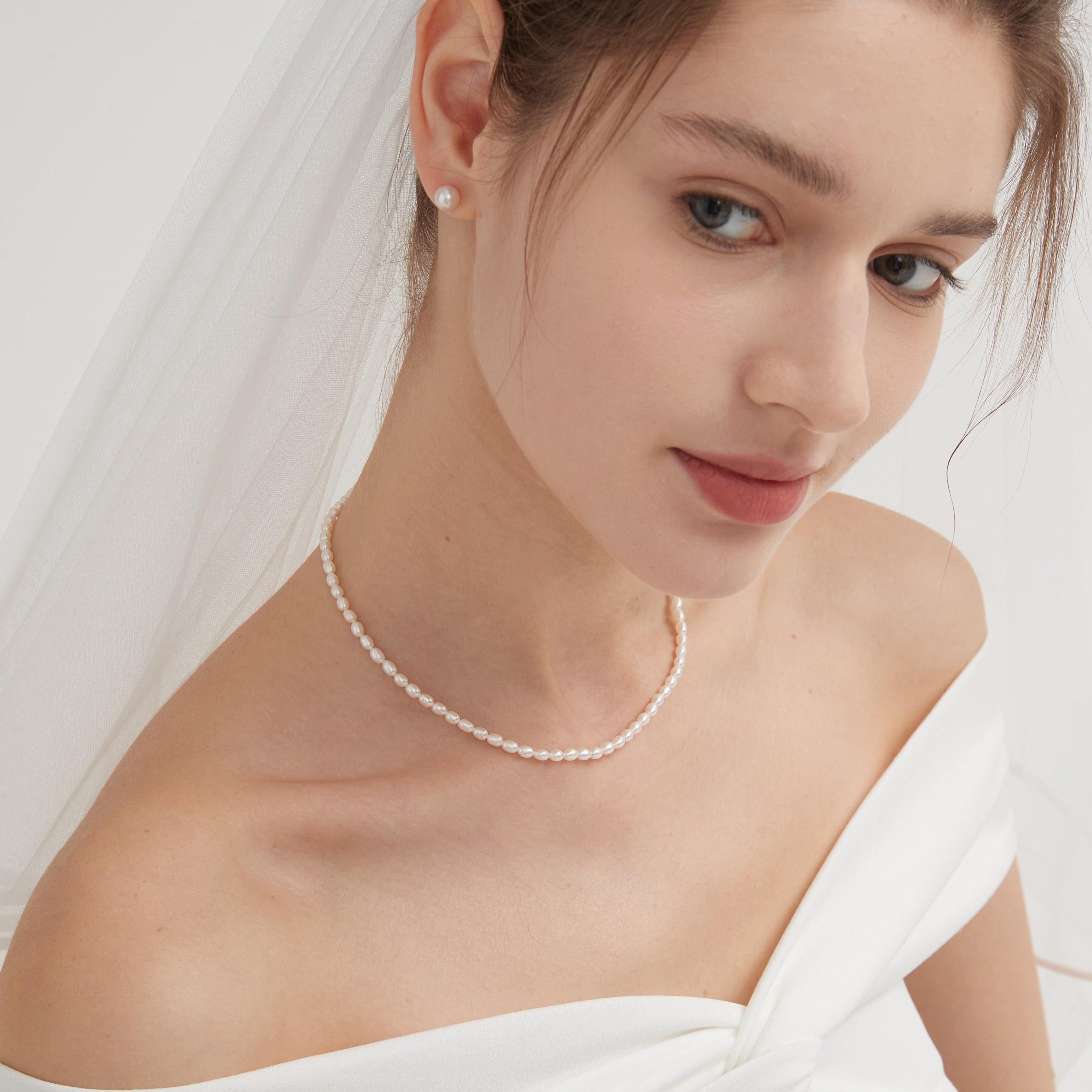 STMG Freshwater Pearl Choker Necklace on neck with a pearl earring